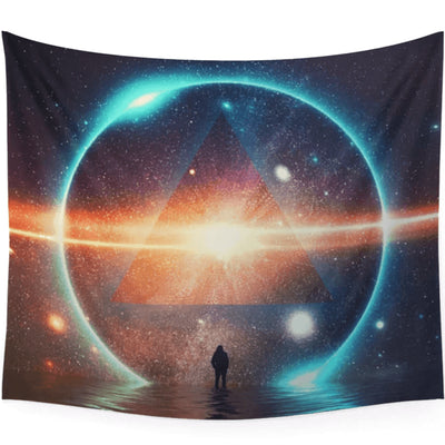 Cosmic Revelation Tapestry featuring a silhouetted figure in water, facing a glowing triangle within a blue ring in a starry galaxy.