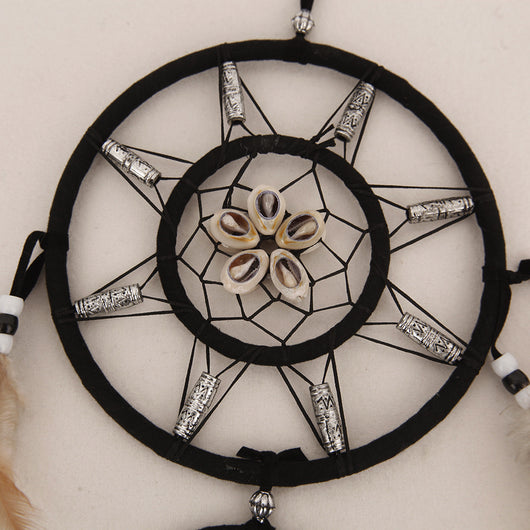 Bohemian dreamcatcher wind chime with black hoops, brown and tan feathers, and black and white beads. - Image 4