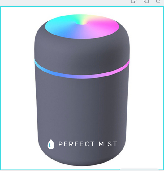 Dark gray ultrasonic aromatherapy essential oil diffuser with a colorful LED light band and rainbow top light. - Image 21