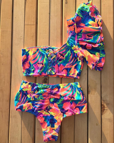 Vibrant one-shoulder ruffle print swimsuit with a lace-up top and high-waisted ruched bottoms, featuring a tropical floral pattern. - Image 11