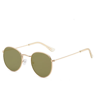 Round gold-framed sunglasses with pink tinted lenses, featuring clear temple tips. - Image 20