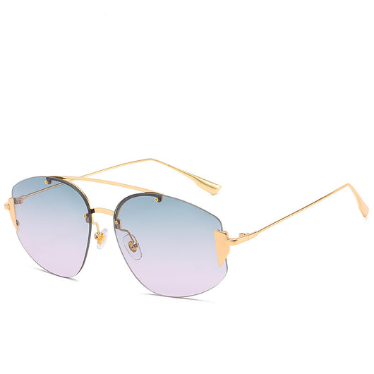 Women's fashion rimless sunglasses with blue to yellow gradient lenses and a gold-colored metal frame. - Image 8