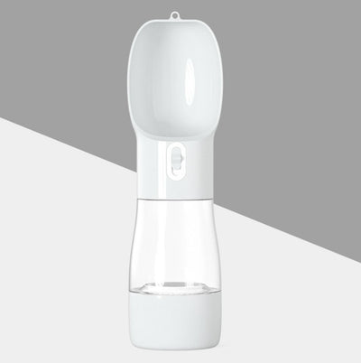White and clear portable dog water dispenser with a built-in bowl and transparent water reservoir. - Image 8