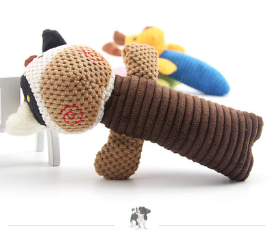 Yellow and blue plush dog toy with ribbed body, alongside a blue dog raincoat with hood and reflective strips. - Image 3
