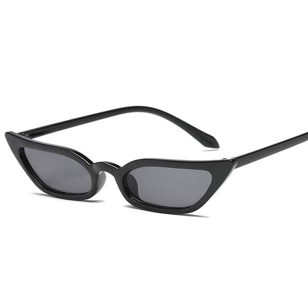 Red small frame cat-eye sunglasses with red tinted lenses on a white background. - Image 15