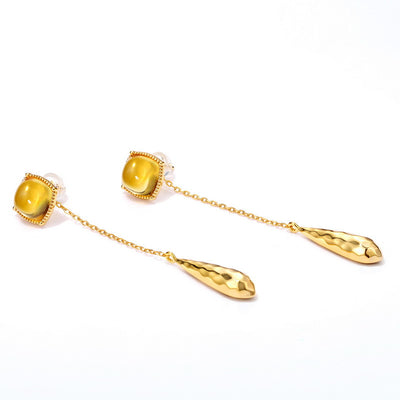 Aretes Geométricos con Borla Colgante - Image 2