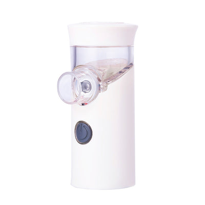 Gray handheld ultrasonic nebulizer with a clear medication chamber and a power button, designed for portable respiratory care.