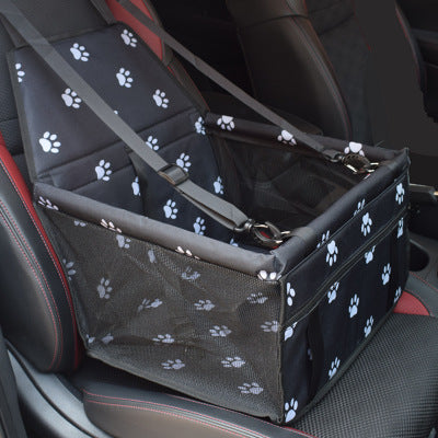 Light grey pet car booster seat with black mesh sides and adjustable straps, installed on a black and red car seat. - Image 7