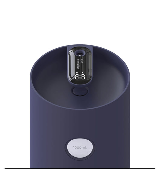 White cylindrical humidifier with a transparent base, digital display, and 1000ml capacity indicator. - Image 15