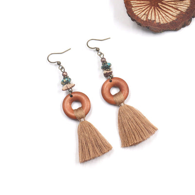Aretes de Madera con Borla Elegante - Image 4