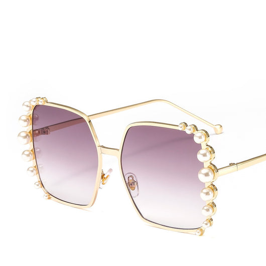 Oversized hexagonal sunglasses with gold-tone metallic frames, light pink lenses, and faux pearl embellishments. - Image 7