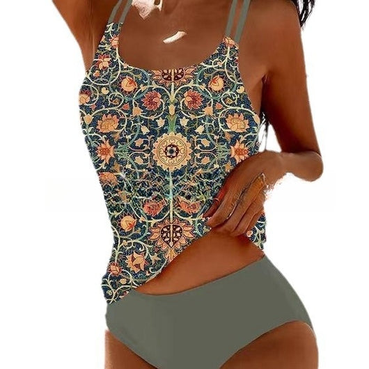 Woman wearing a red retro split high waist tankini swimsuit with an ornate mandala print top on a beach. - Image 2