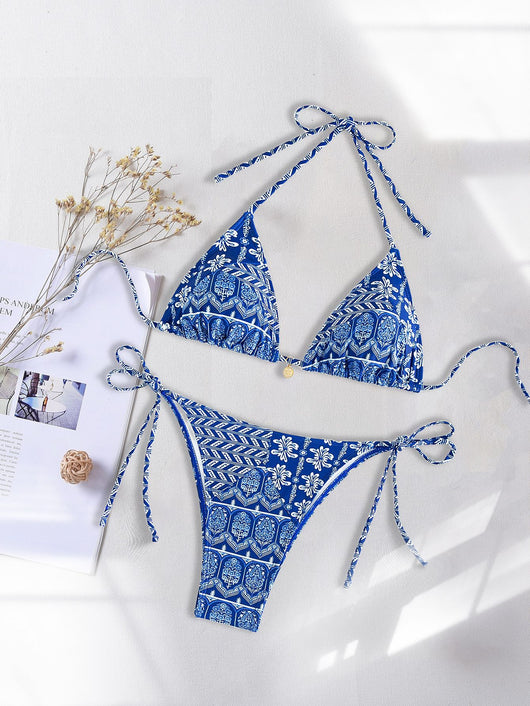 Red floral print triangle cup bikini set with matching bottom, featuring a small gold charm on the top. - Image 28