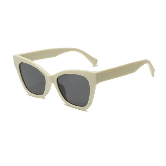 Fashion sunglasses with clear oval frames, dark gray lenses, and tortoise shell patterned temples. - Image 19