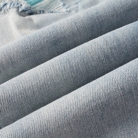 Jeans Azul Cielo Desgastado con Roturas Vintage para Hombre - Image 25