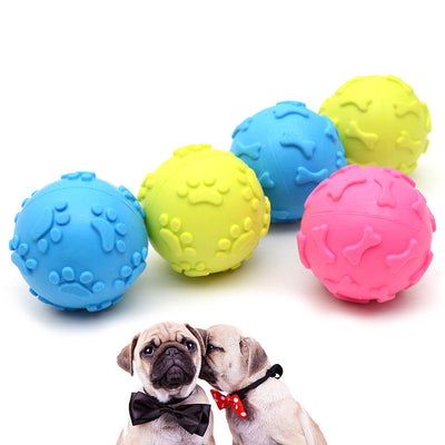 Five colorful TPR rubber pet toy balls in blue, pink, and yellow, with embossed paw print and bone patterns. - Image 14