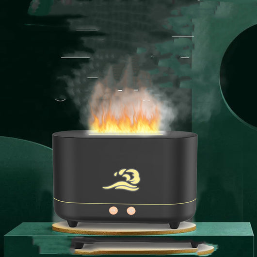 White simulated flame humidifier with a golden wave logo, emitting orange light and mist, on a dark green background.