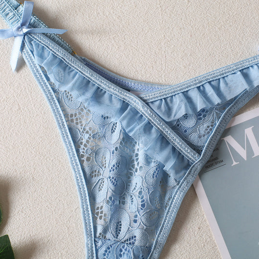 Light blue lace bralette and thong lingerie set with bow details and ruffle trim, displayed on a light surface. - Image 17