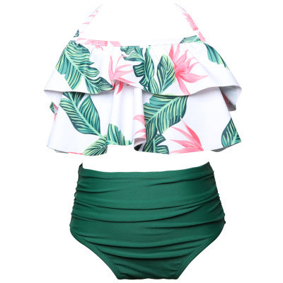 Black wrap bikini top with high-waisted pink and green tropical leaf print swim bottoms. - Image 33