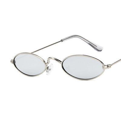 Retro oval frame sunglasses with vibrant red lenses and shiny gold-colored metal frames on a white background. - Image 18