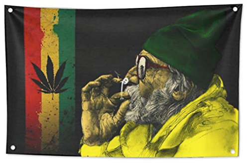 Decorative tapestry featuring an old man in a green hat smoking, with a Rasta stripe and cannabis leaf.
