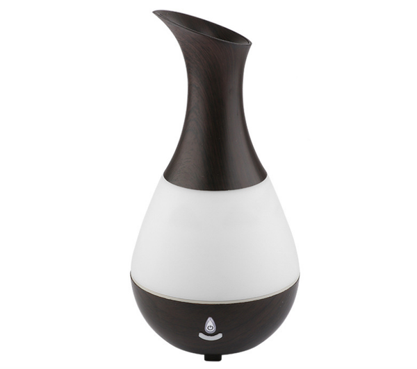 White teardrop-shaped aromatherapy humidifier with a curved neck and a power button, featuring a translucent middle section. - Image 3