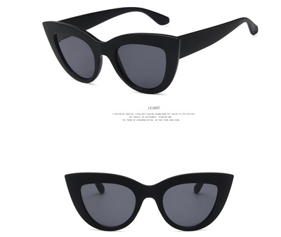 White and black cat eye sunglasses with gradient lenses, featuring a retro style. - Image 6