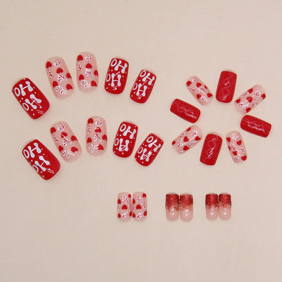 Uñas Postizas Navideñas con Brillo Rojo y Detalles de Amor - Image 4