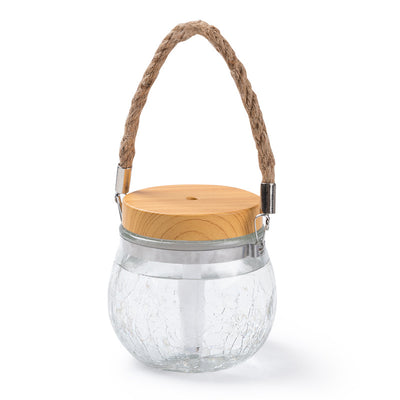 Desktop humidifier with a clear, crackled glass base, white lid, and a brown rope handle. - Image 13