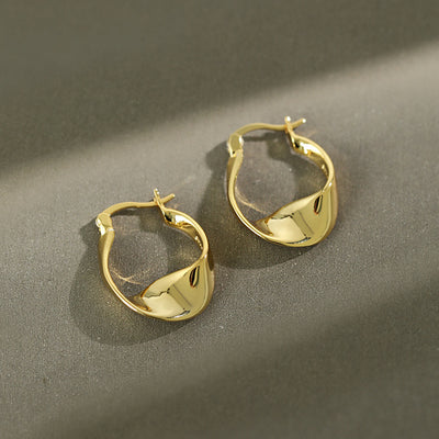 Aretes de plata esterlina con diseño retorcido y acabado brillante - Image 7