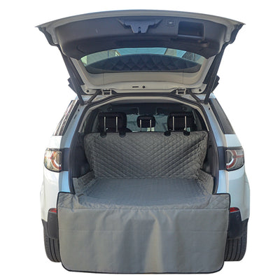 Gray quilted pet car mat installed in the trunk of a white SUV, protecting the cargo area and bumper. - Image 4