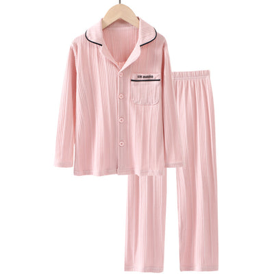 Beige ribbed cotton children's pajama set with long-sleeved lapel top and matching pants, featuring black trim. - Image 4