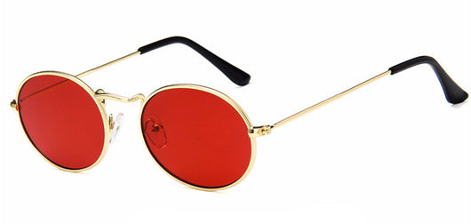 Retro round sunglasses with pink lenses and a gold-colored metal frame, featuring black ear tips. - Image 7