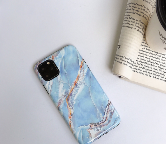 Funda para celular con patrón mármol y doble capa protectora