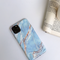 Funda para celular con patrón mármol y doble capa protectora