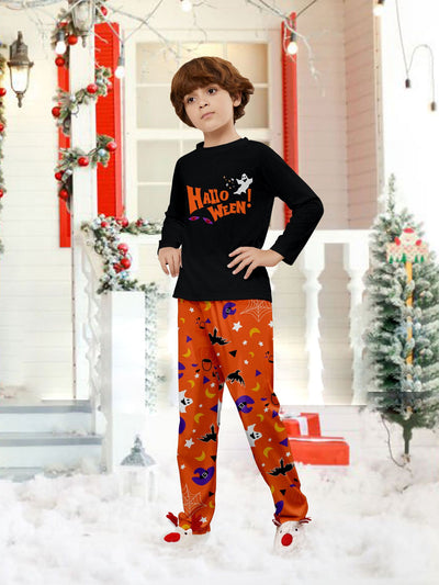 Family of four wearing matching black and orange Halloween long-sleeve pajamas with ghost and bat prints. - Image 19