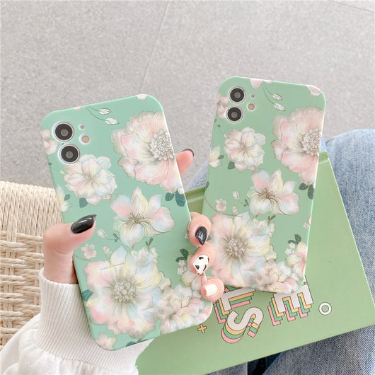 Funda para teléfono con flores y fondo verde