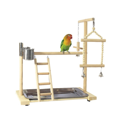 Wooden parrot play stand with perches, ladder, stainless steel food cups, and hanging bells, featuring a lovebird. - Image 3