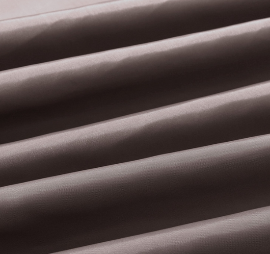 Solid brown polyester shower curtain with metal grommets and hooks, hanging from a silver shower rod. - Image 3