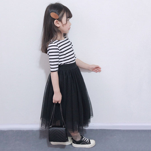 Children's two-piece dress with a black and white striped short-sleeve top and a black gathered tulle skirt. - Image 3