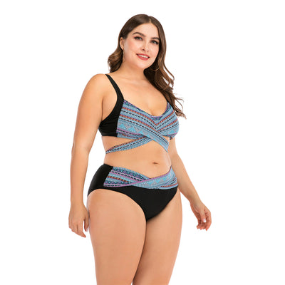 Plus size two-piece swimsuit with a black base, colorful geometric pattern, criss-cross top, and high-waisted bottom. - Image 4