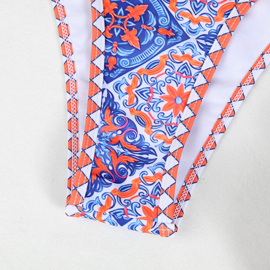 Retro 4-color printed women's bikini with red, blue, and white paisley pattern, featuring a triangle top and high-cut bottom. - Image 15