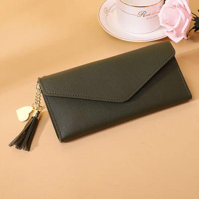 Bolso de mano con borlas decorativas - Image 5