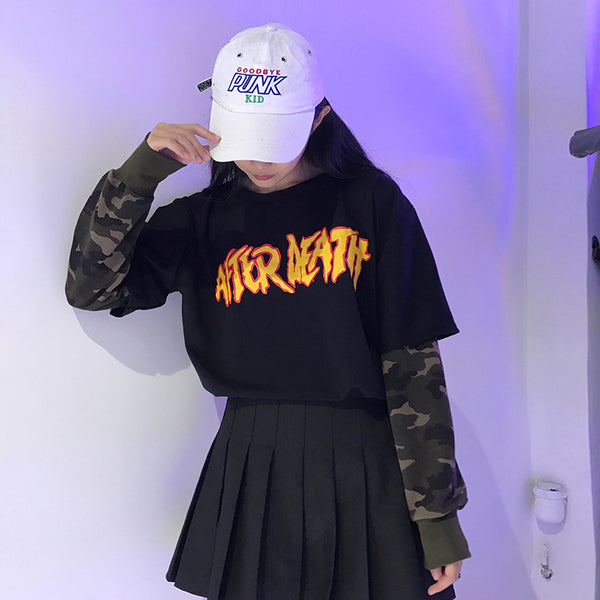 Suéter Holgado Estilo Coreano con Mangas Camuflaje y Estampado de Letras
