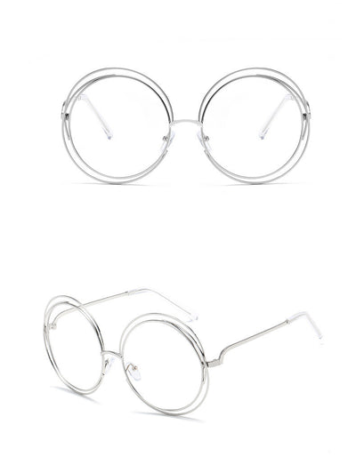 Round metal cutout sunglasses with silver mirrored lenses and a double-rimmed frame, shown from front and angled views. - Image 15