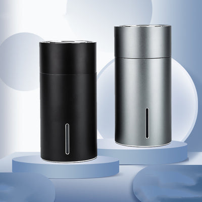 Black cylindrical vehicular humidifier with a silver trim and a vertical indicator light on a white background. - Image 12