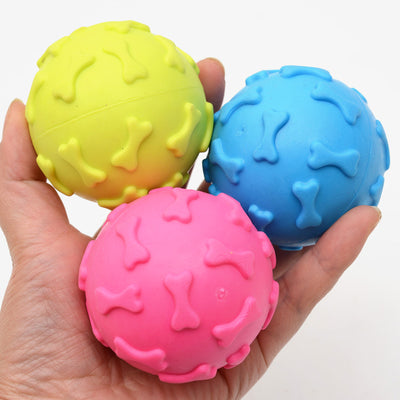 Five colorful TPR rubber pet toy balls in blue, pink, and yellow, with embossed paw print and bone patterns. - Image 13