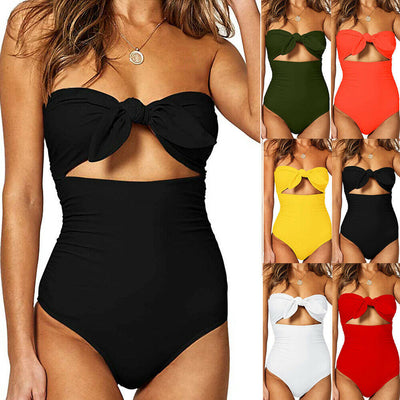Bright yellow one-piece swimsuit with a strapless bandeau top, front tie-knot, and a cutout detail.