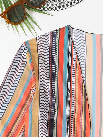 Four-piece swimsuit set with a colorful striped bikini, tassel shorts, and a matching kimono cover-up. - Image 16