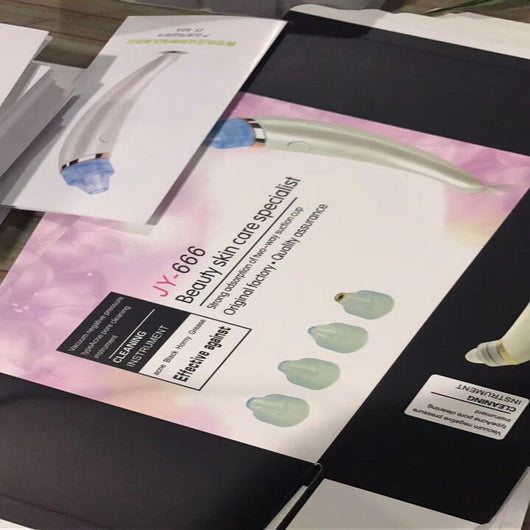 Rose gold and white electric blackhead suction instruments with clear heads, displayed next to their product box. - Image 5